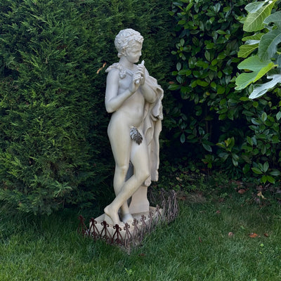 Satyr Playing a Flute Statue